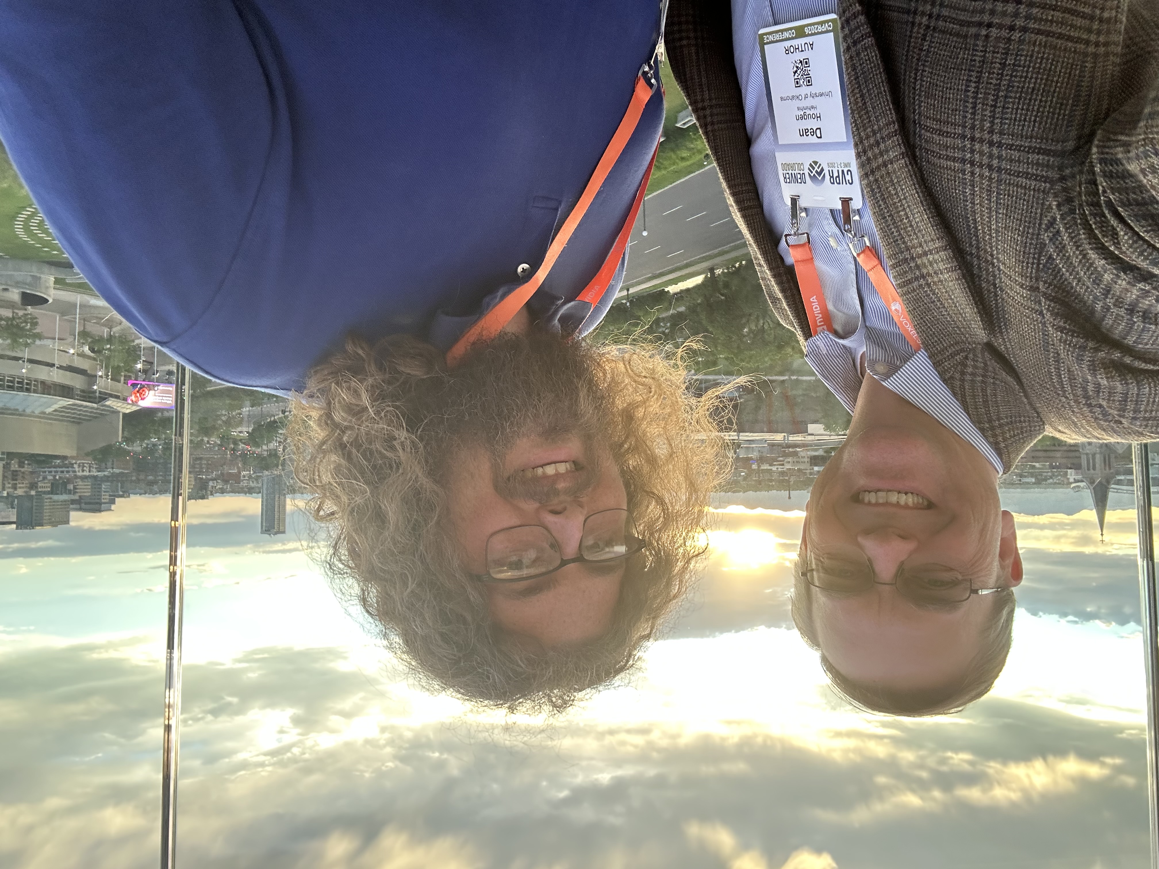 Dr. Dean Hougen and the UF Data Studio's Christopher William Driggers-Ellis standing on the terrace of the Colorado Convention Center during the Reception on Saturday June 6, 2026